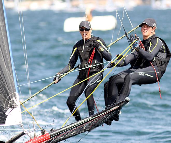 Its all concentration by Steve and Sam as they avoid a passing ferry © Frank Quealey